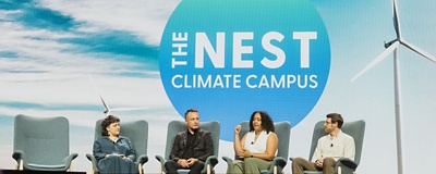 Climate leaders on stage for a panel discussion during Climate Week NYC. 